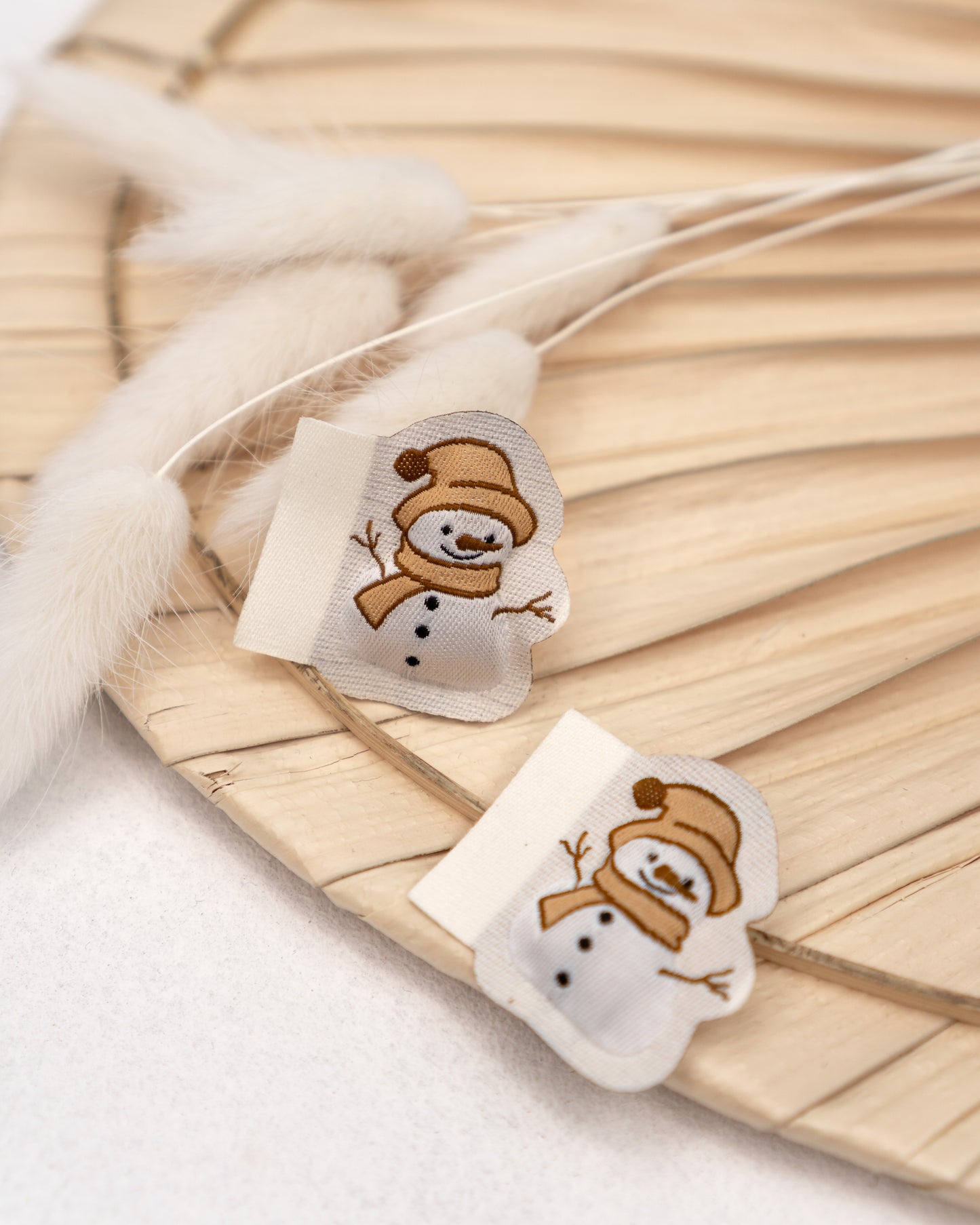 Schneemann - Puff Web Label
