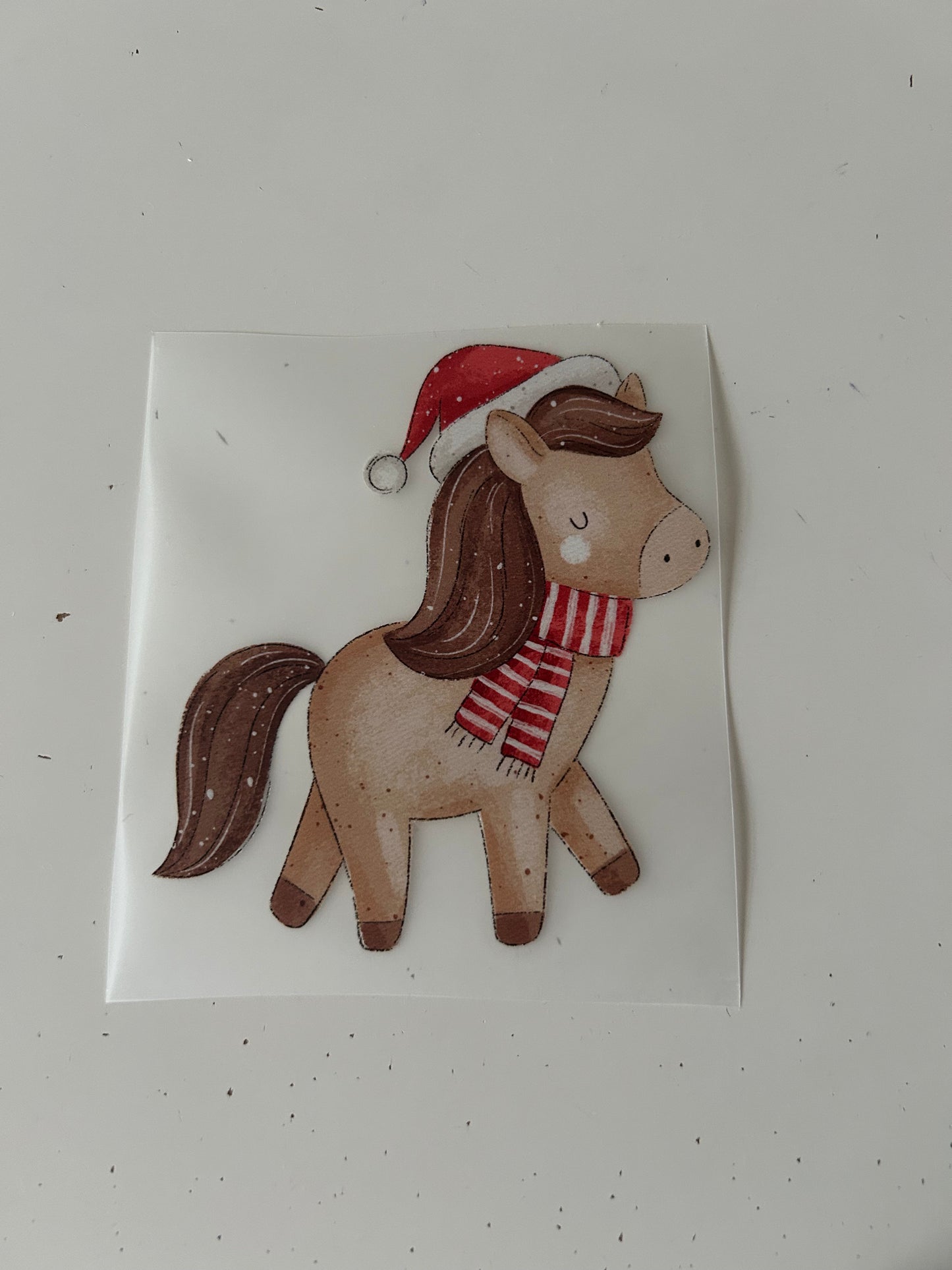 Pferd mit Weihnachtsmütze - Bügelbild