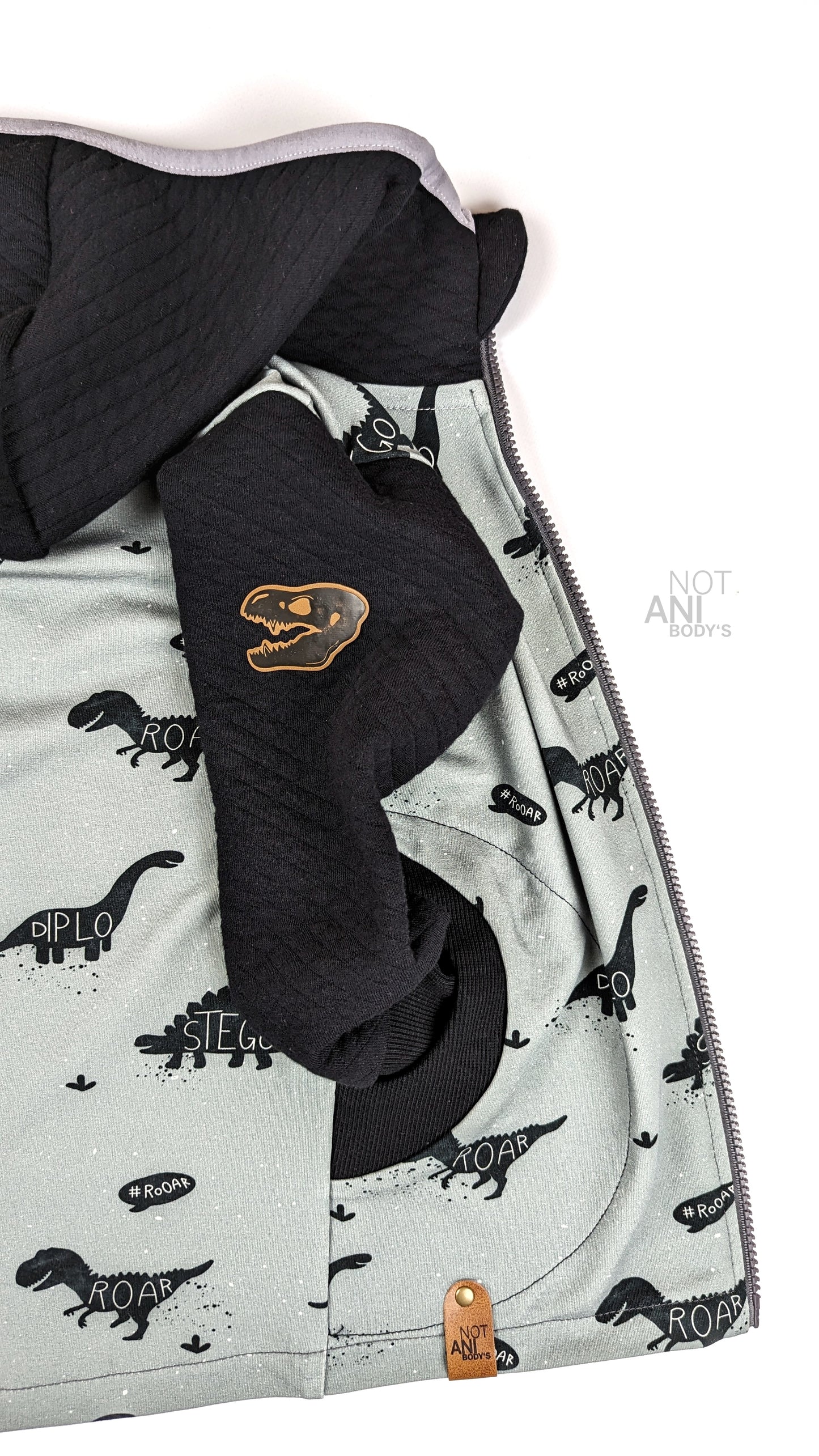 Dino Kopf Knochen- Kunstleder Label
