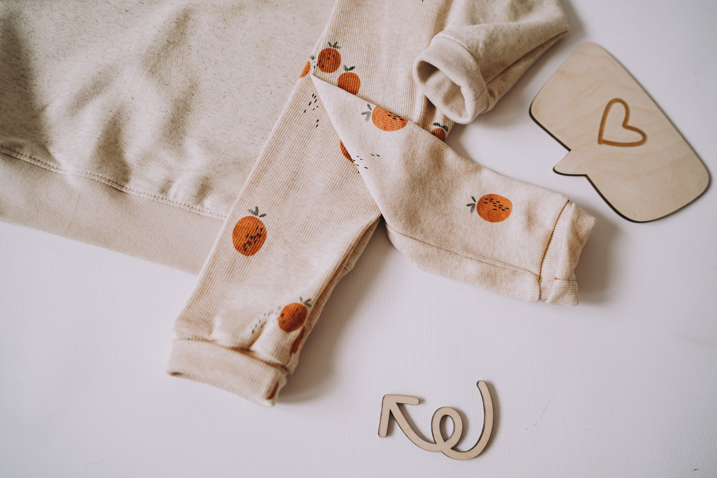 Orangen - Rib Jersey ecru meliert