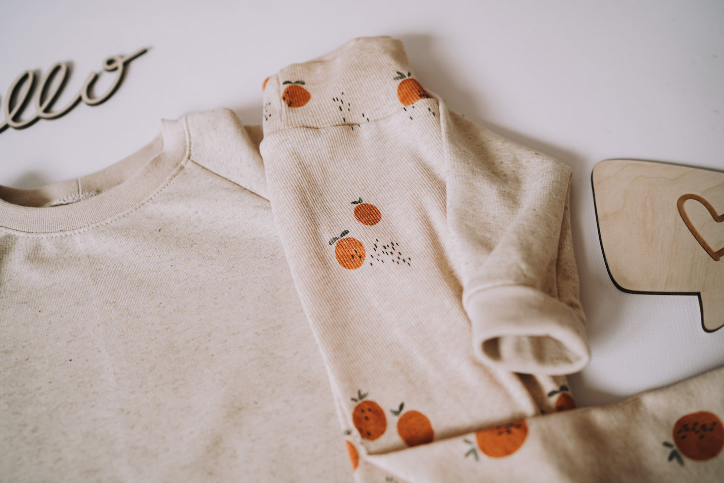 Orangen - Rib Jersey ecru meliert