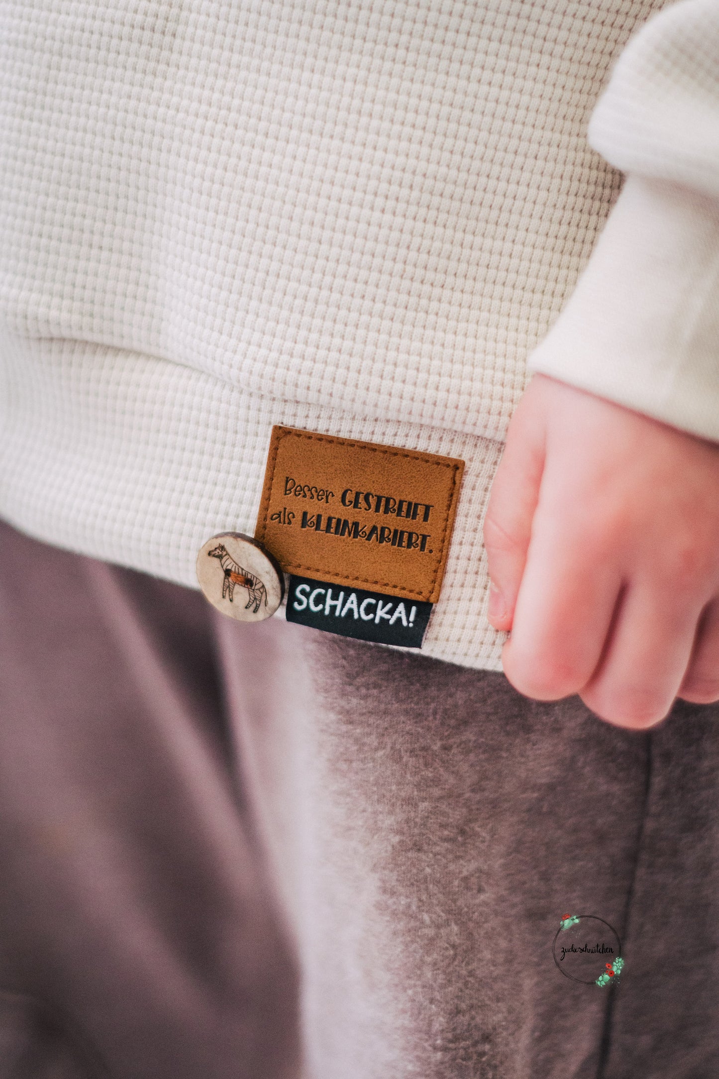 Besser gestreift als Kleinkariert Label