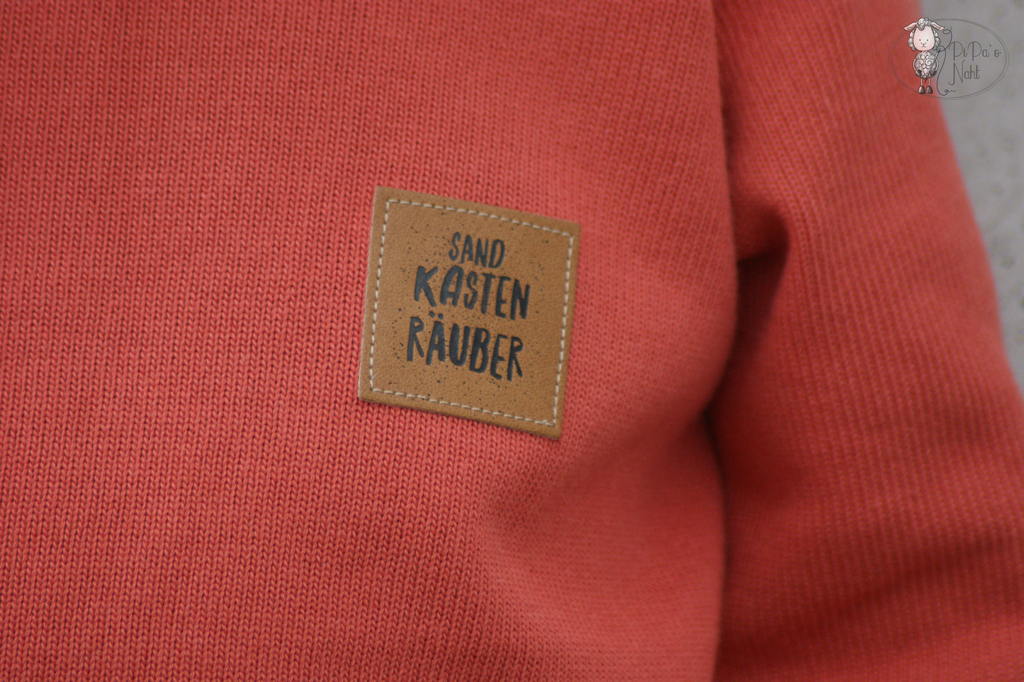 Sandkasten Räuber Label