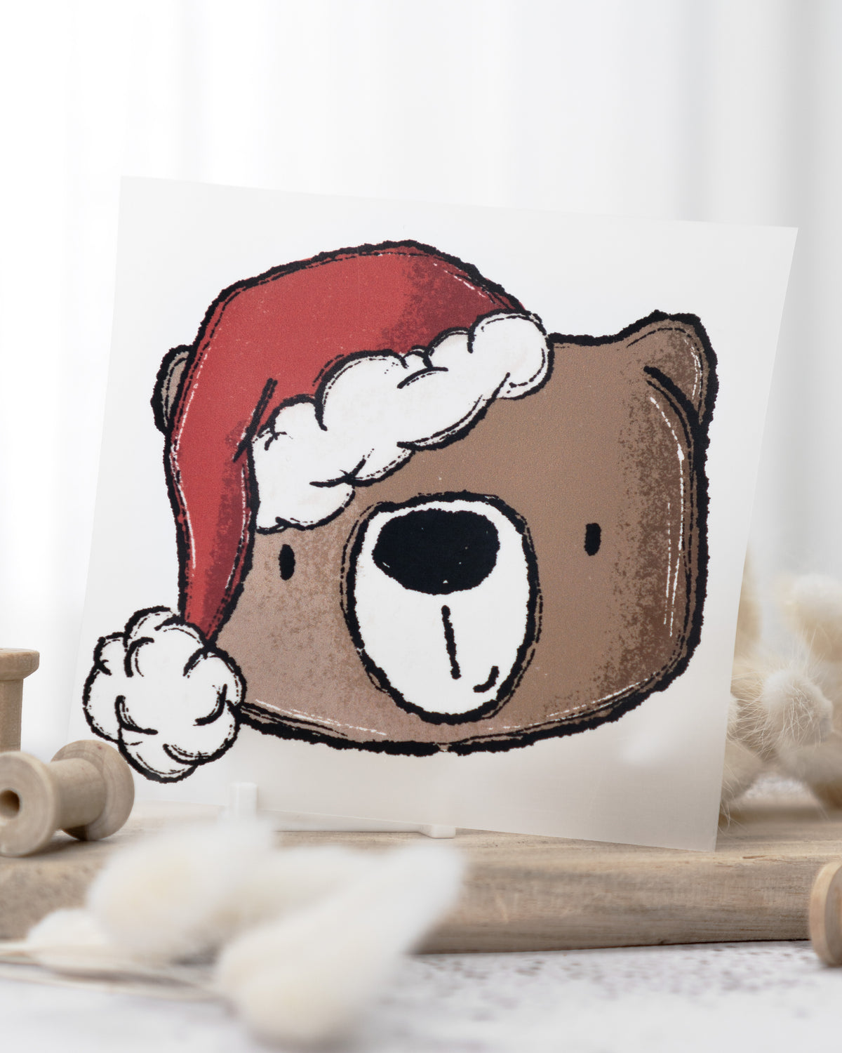 Bär mit Weihnachtsmütze - Bügelbild