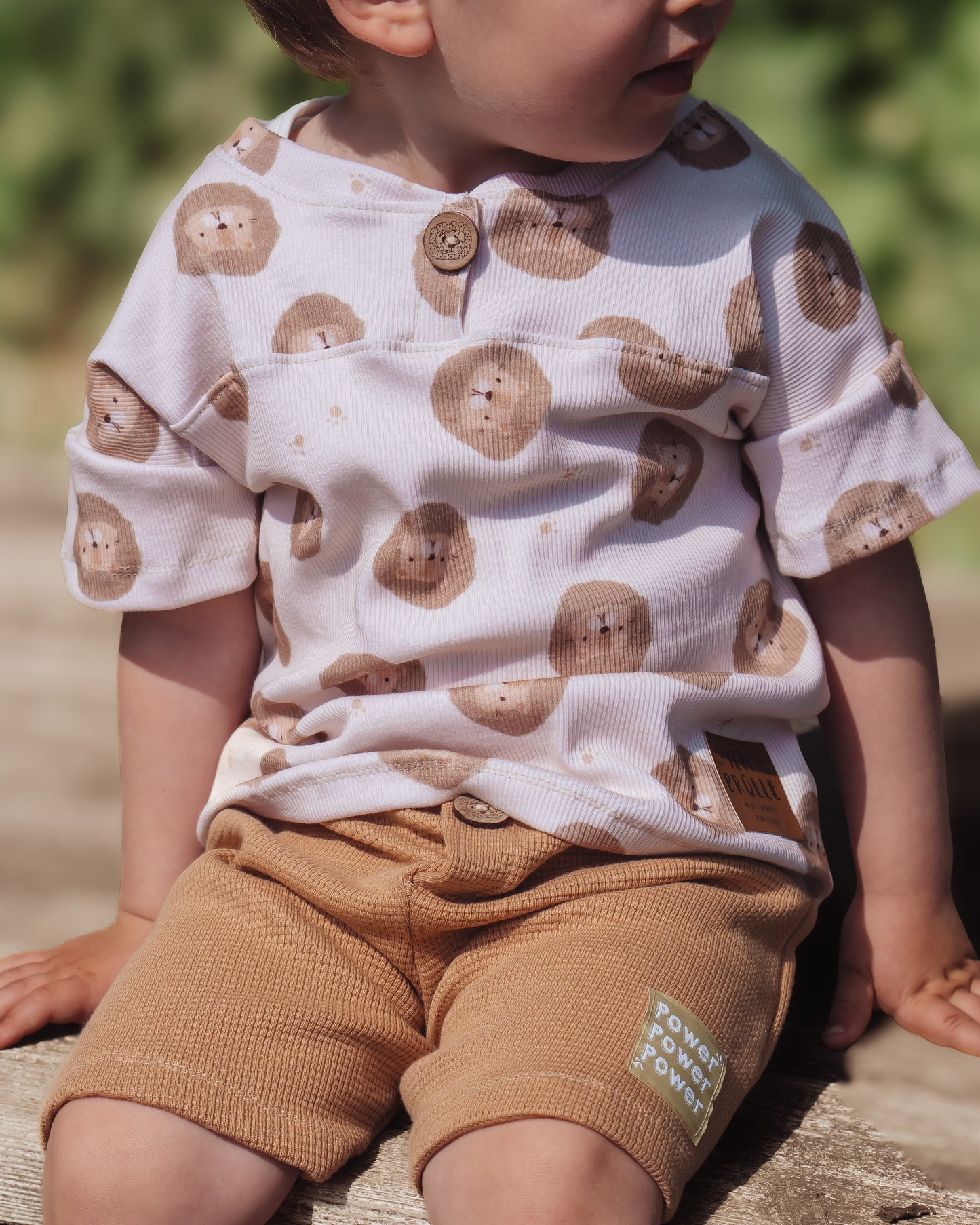 Löwen cream mit Fußspuren - Bio Rib Jersey