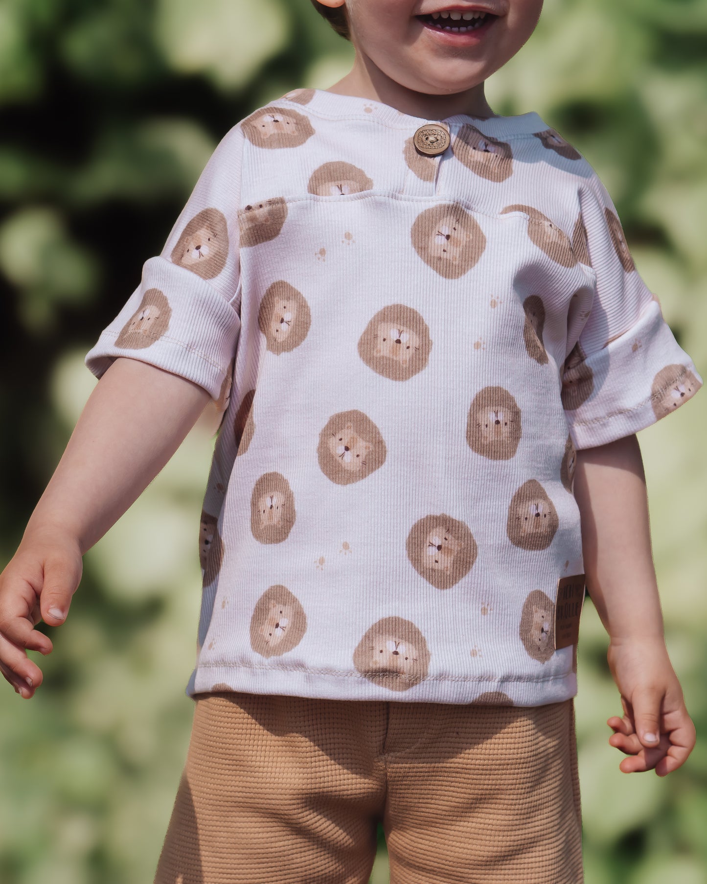 Löwen cream mit Fußspuren - Bio Rib Jersey