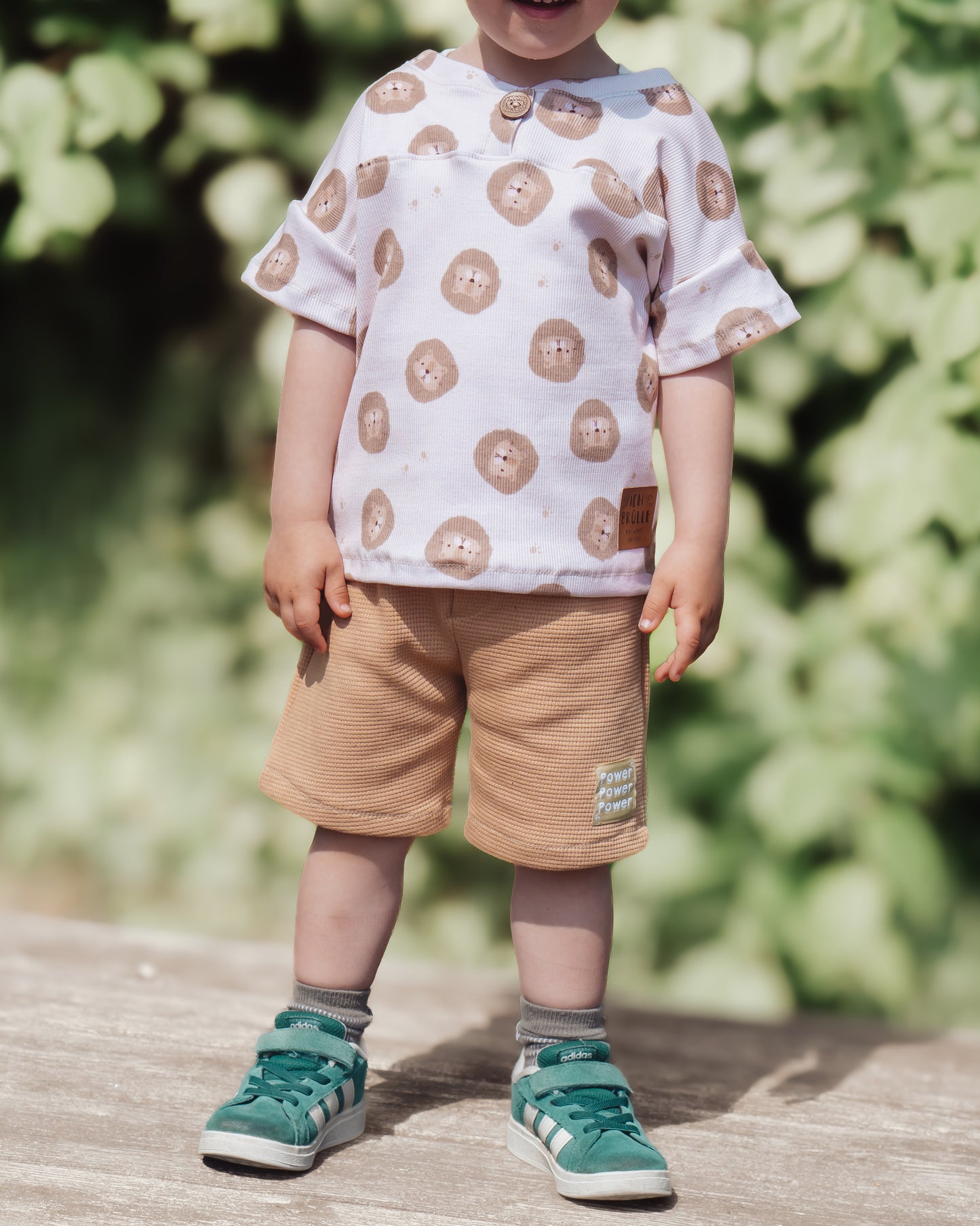 Löwen cream mit Fußspuren - Bio Rib Jersey