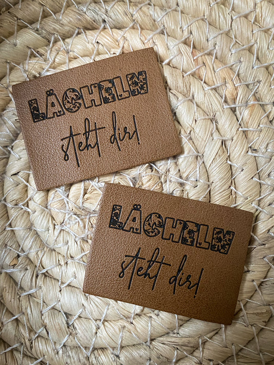 Lächeln steht dir - Kunstleder Label