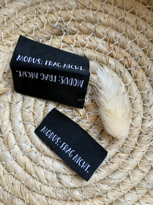 Modus: Frag nicht! schwarzes Web Label