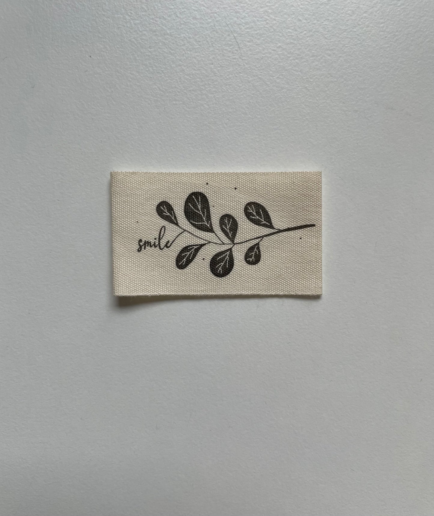 Smile Zweig Baumwoll Label